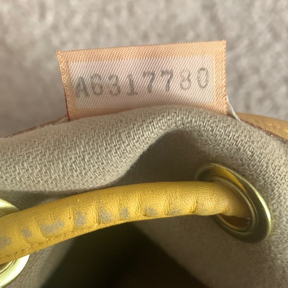 Dooney & Signature Sling Bucket Bag - Picture 9 of 12